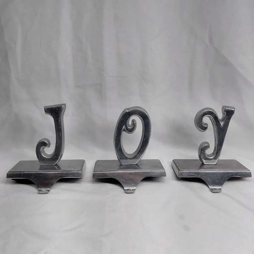 Vintage Cast Iron JOY Christmas Stocking Holders Mantel Hangers Weighted Set